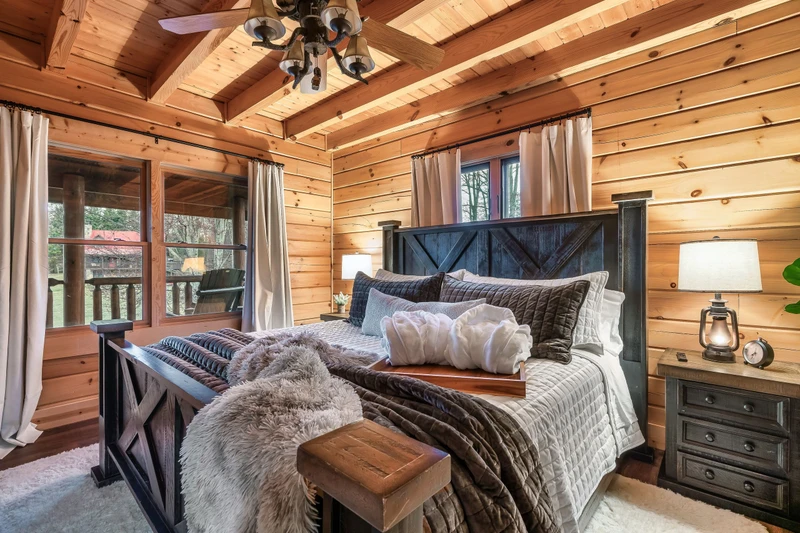 Main level king bedroom designed for rest and comfort.