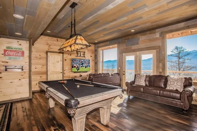 cabin amenities like a pool table is one of the best things to do in Gatlinburg when it rains