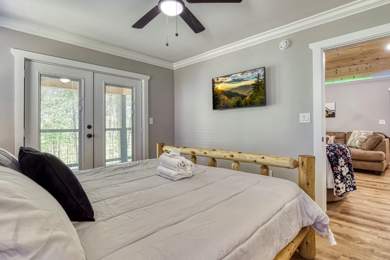 Mountain Lake Home bedroom with king size bed and 44 inch TV