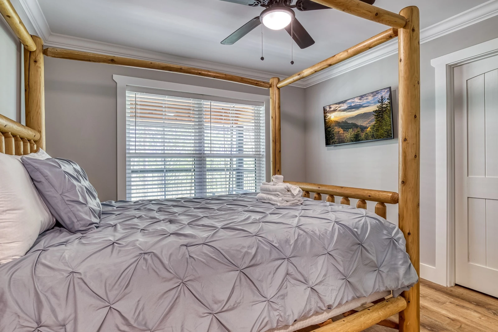 Mountain Lake Home bedroom with queen size bed and 44 inch TV