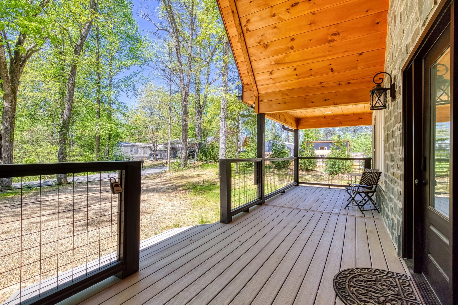 Mountain Lake Home covered entry deck
