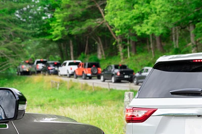 line of cars in cades cove