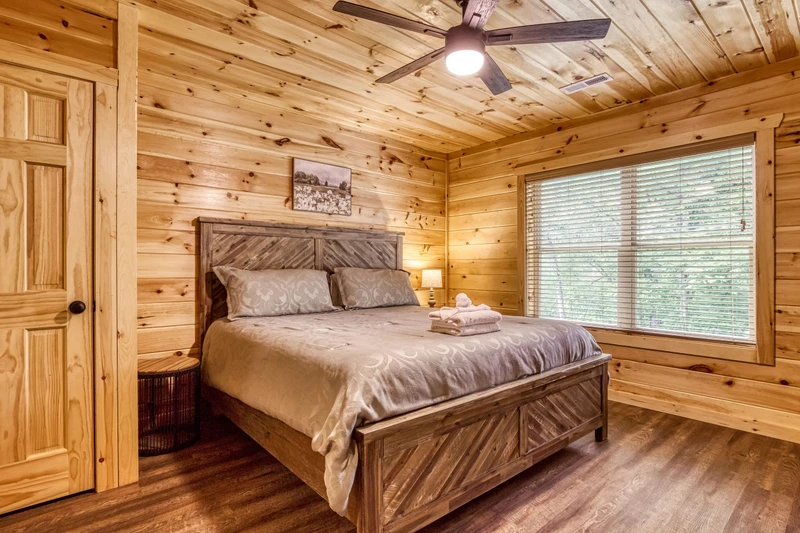 Mountain Memories king size bed in lower level bedroom