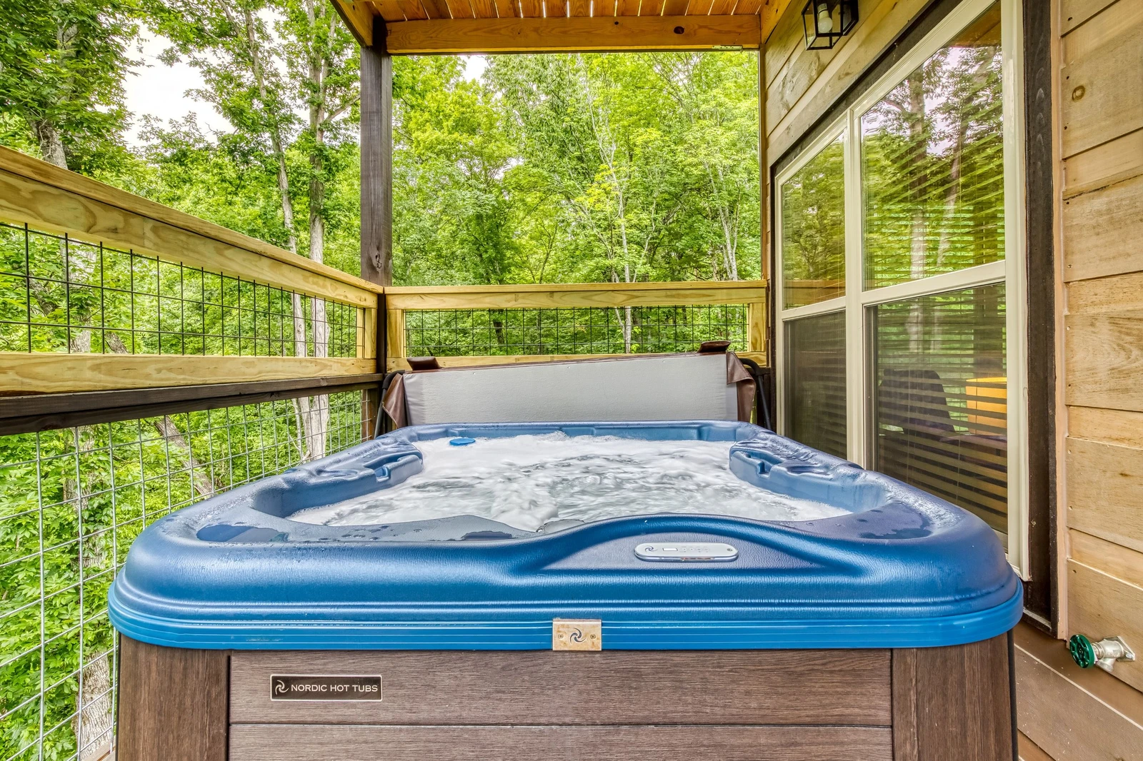 Mountain Memories lower level deck with hot tub