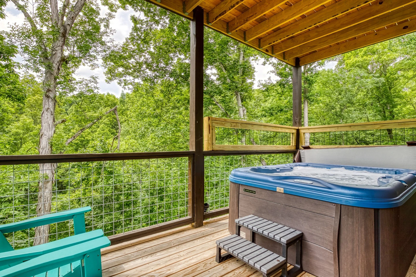 Mountain Memories hot tub on lower level covered deck