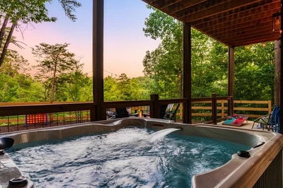 Soak in the hot tub with backyard views