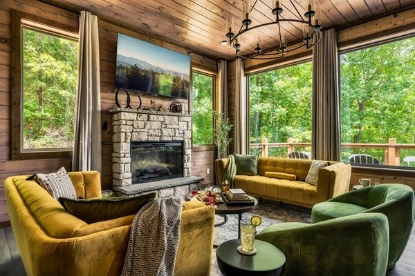 Stylish living room with lush seating, electric fireplace, perfect for family time