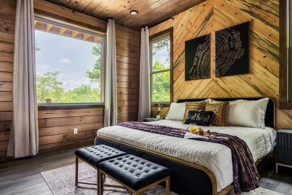 Bedroom 1: Master bedroom with king bed on main level with 58 inch Roku HDTV with en suite full bathroom