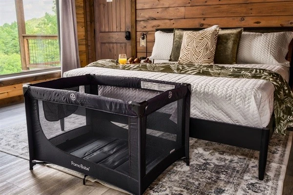 Bedroom 3: king bed on second floor with the electric fireplace, 58 inch Roku HDTV with en suite full bathroom