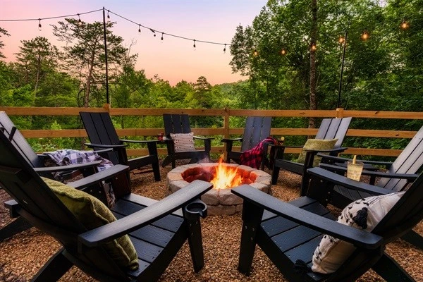 Backyard with fire pit and string lights