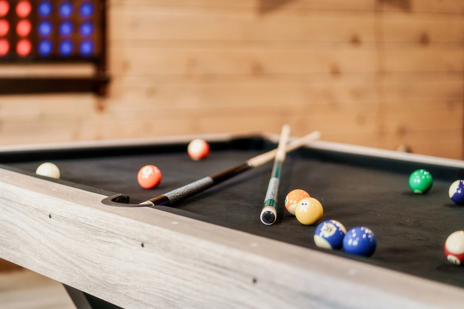Game Room with pool table, arcades, other games and TV, Theater in background