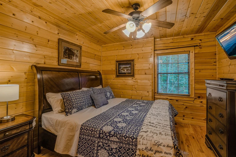 3rd bedroom on lower level with king bed with ensuite bathroom