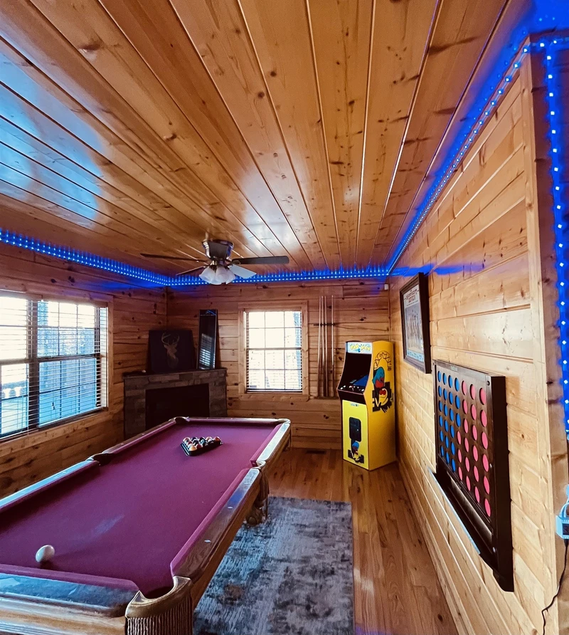 Game room with pool table, arcade game, and Connect 4