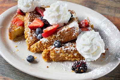 French toast with berries and whipped cream