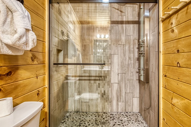 Bearadise Mountain Lodge main level bathroom with walk in shower