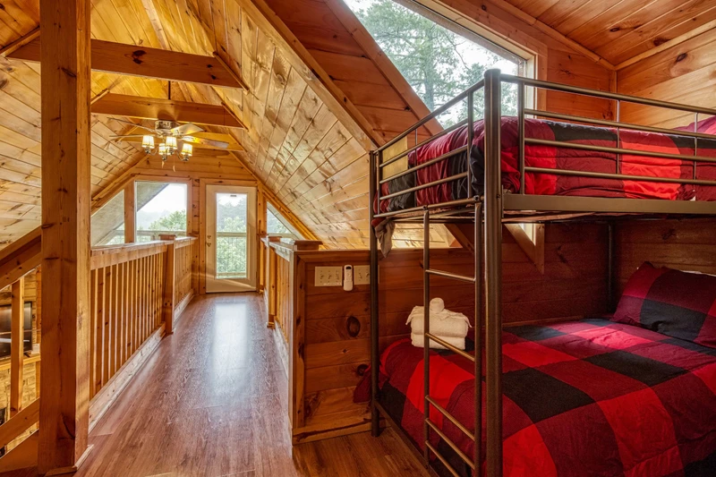 Bearadise Mountain Lodge upper level loft area with bunk beds