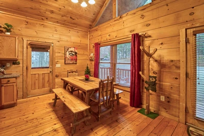 Dine at the kitchen table where six can sit comfortably.