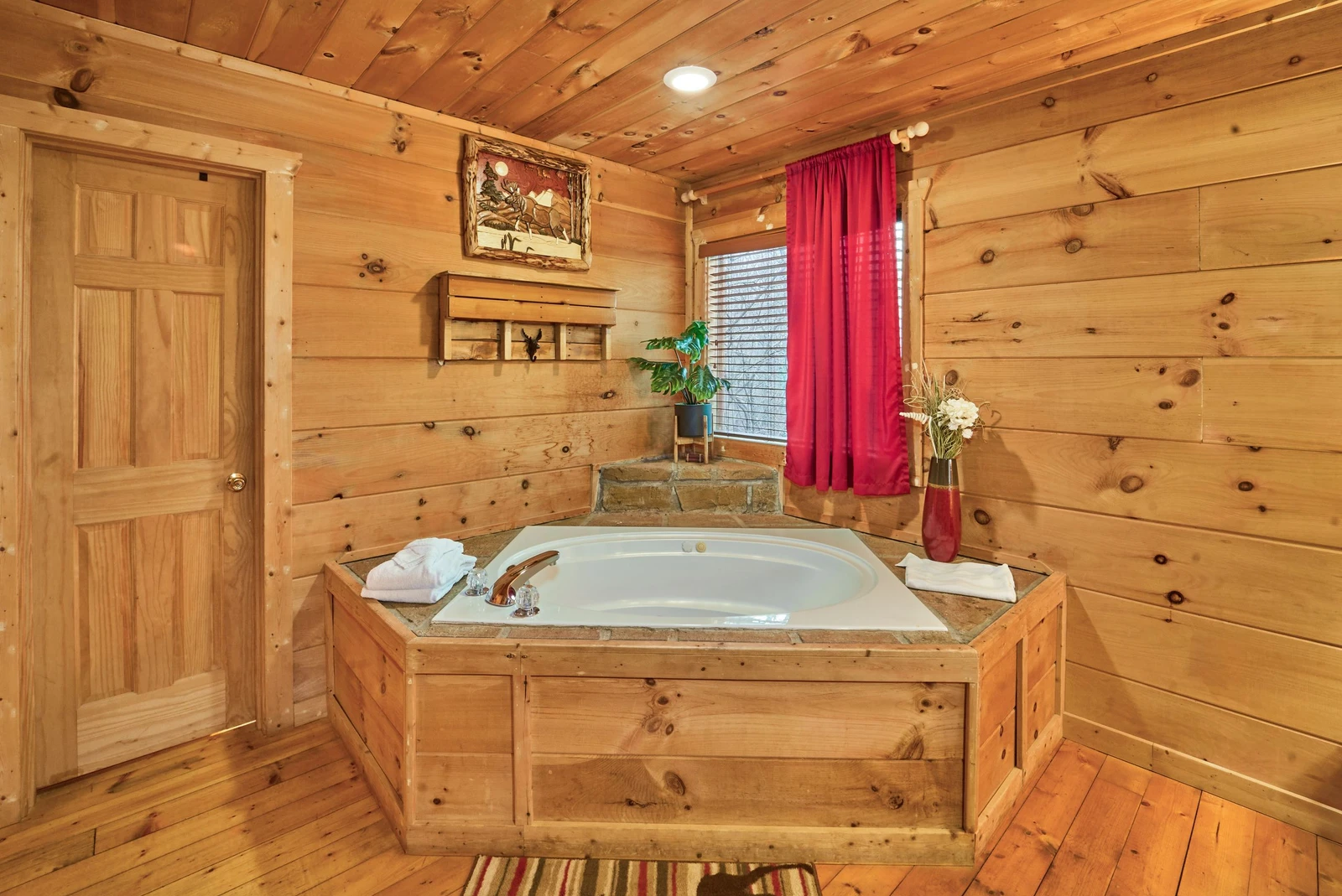 The primary bedroom has a jacuzzi tub for your enjoyment.