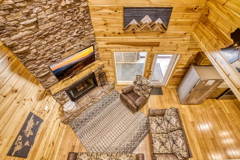 Woodness Gracious view of living room from the upper level
