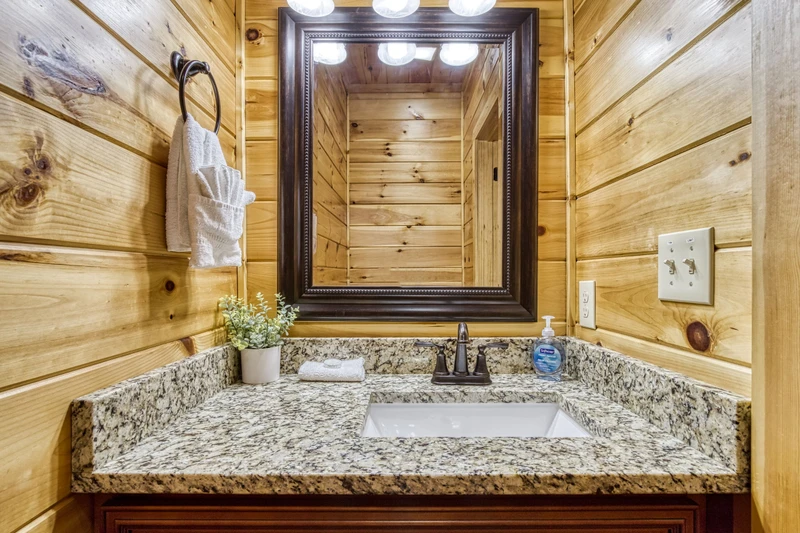 Woodness Gracious main level half bath
