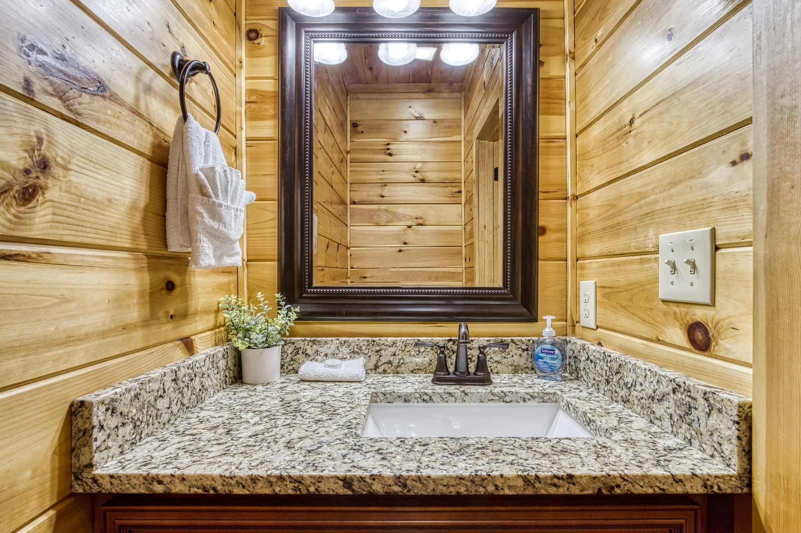 Woodness Gracious main level half bath