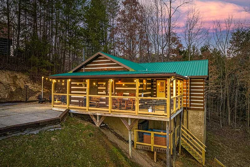 A charming 2 bedroom cabin with a hot tub located in a wooded setting between Pigeon Forge and Gatlinburg.