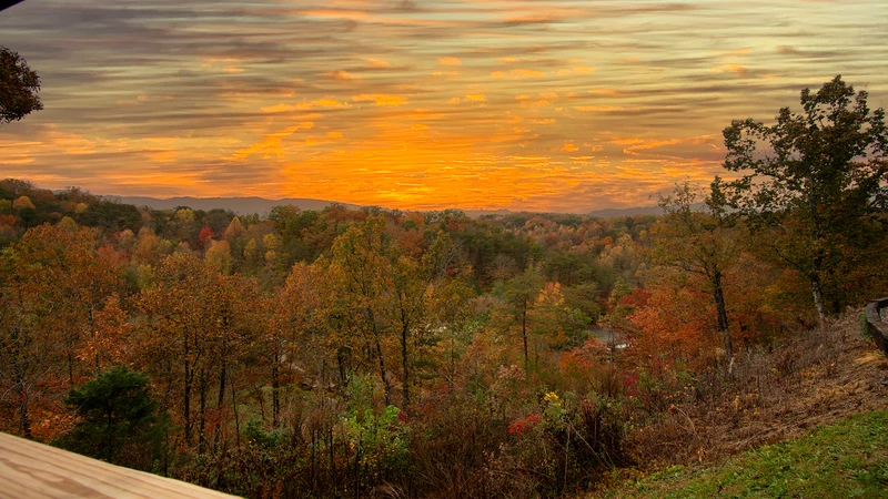 Smoky Mountains sunset as seen from the porch of Moojnlight Obsession cabin rental.