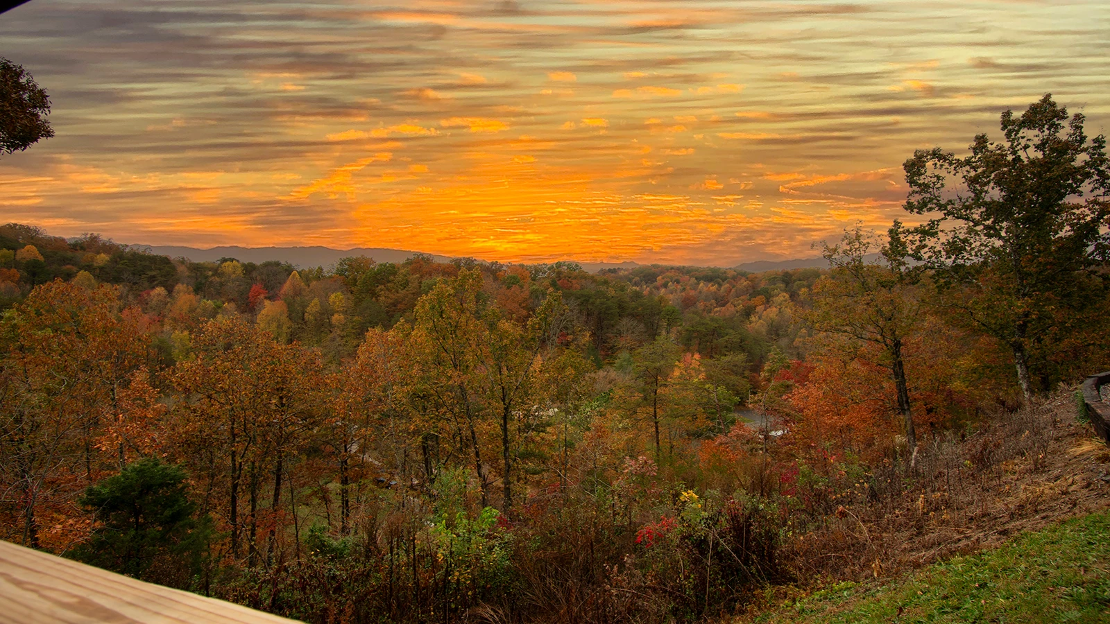 Smoky Mountains sunset as seen from the porch of Moojnlight Obsession cabin rental.