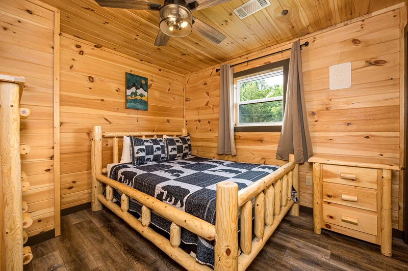Comfortable cabin log bed in the Smokies.
