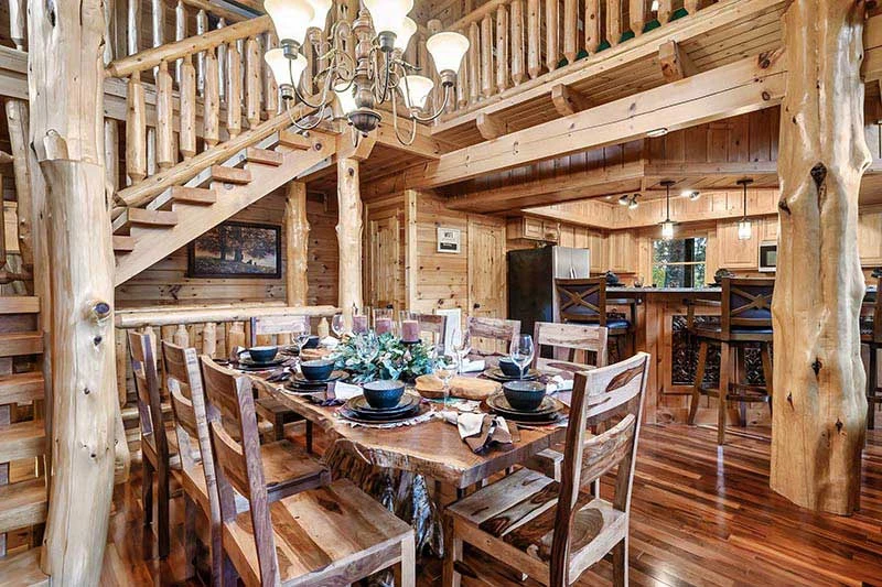 View of the large dining table into the kitchen.