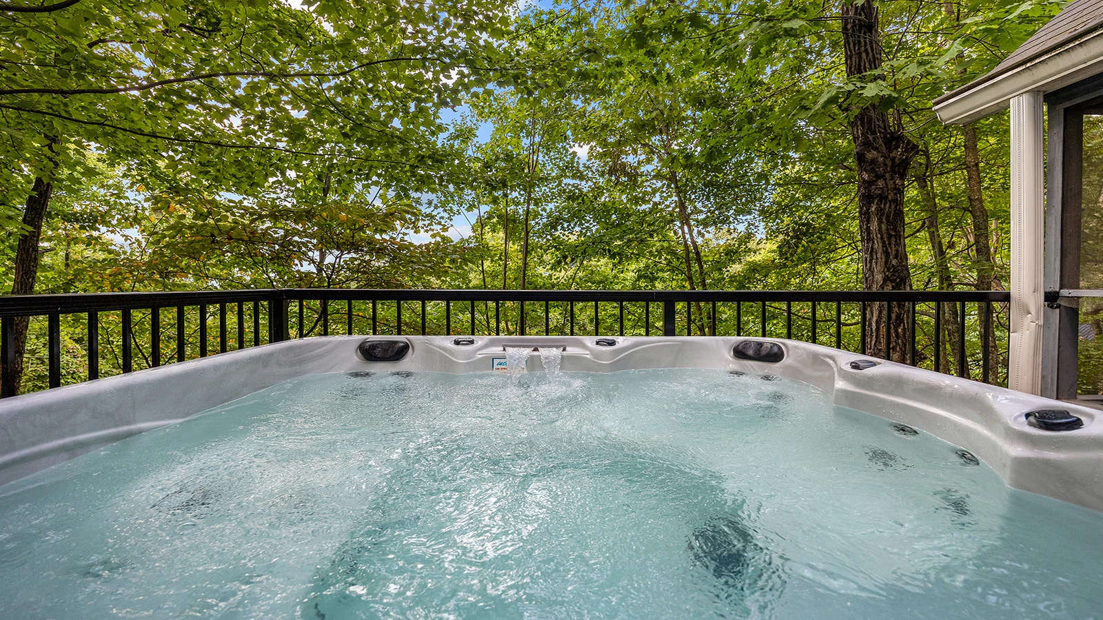 Hot tub located at your Gatlinburg chalet in Chalet Village with access to three resort pools.