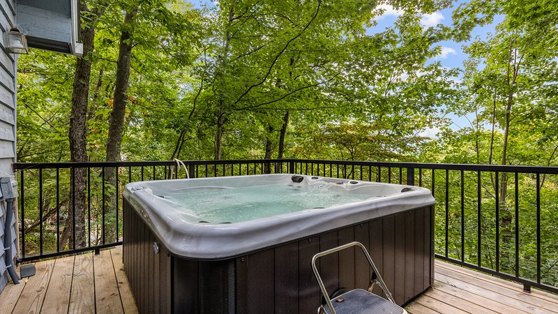 Your chalet's hot tub in Chaqlet Village where you can also enjoy three pools, tennis courts, arcades and more!