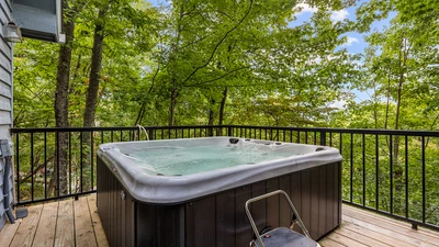Your chalet's hot tub in Chaqlet Village where you can also enjoy three pools, tennis courts, arcades and more!