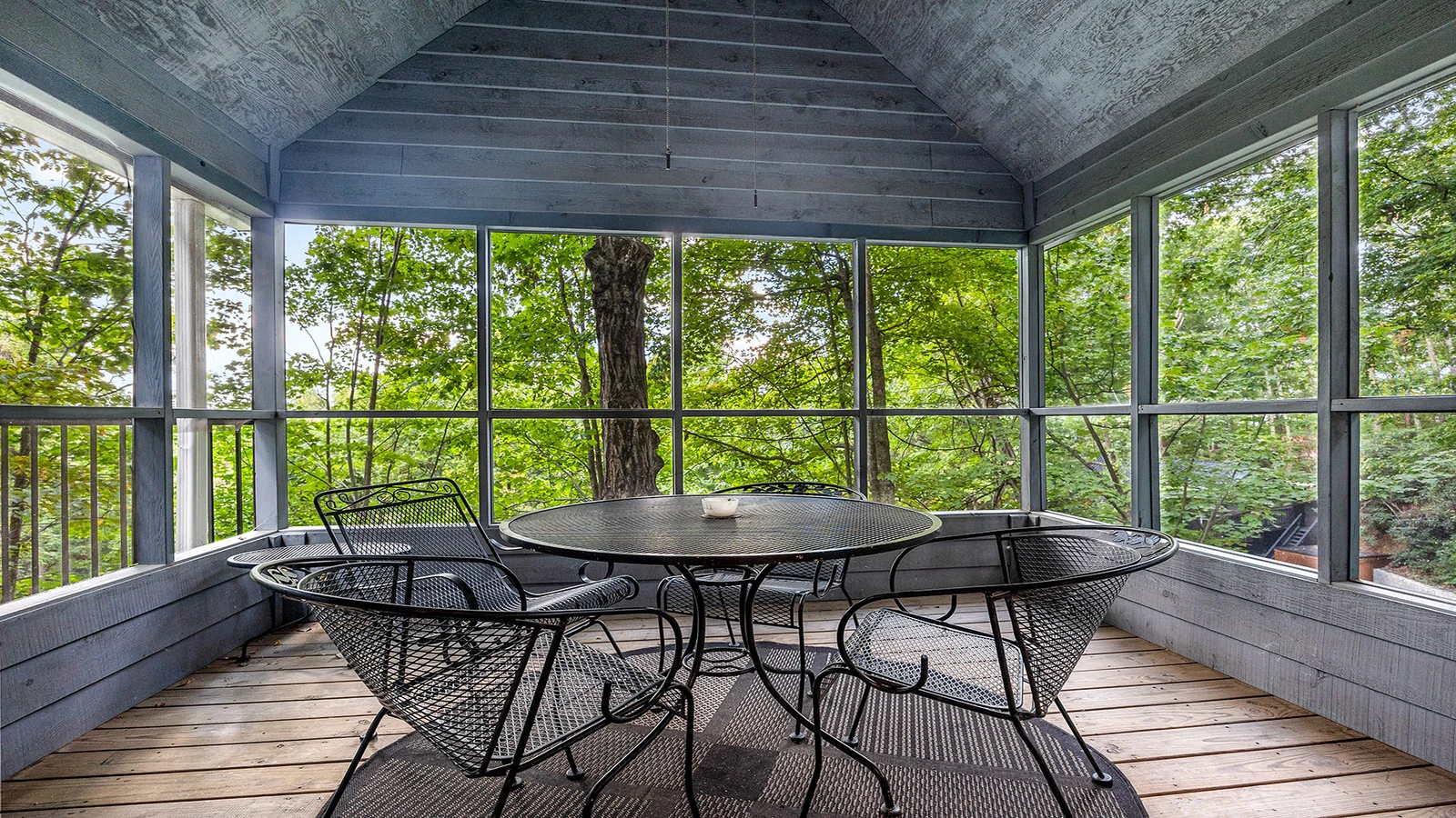 Dine outdoors with family and friends in this enclosed area.