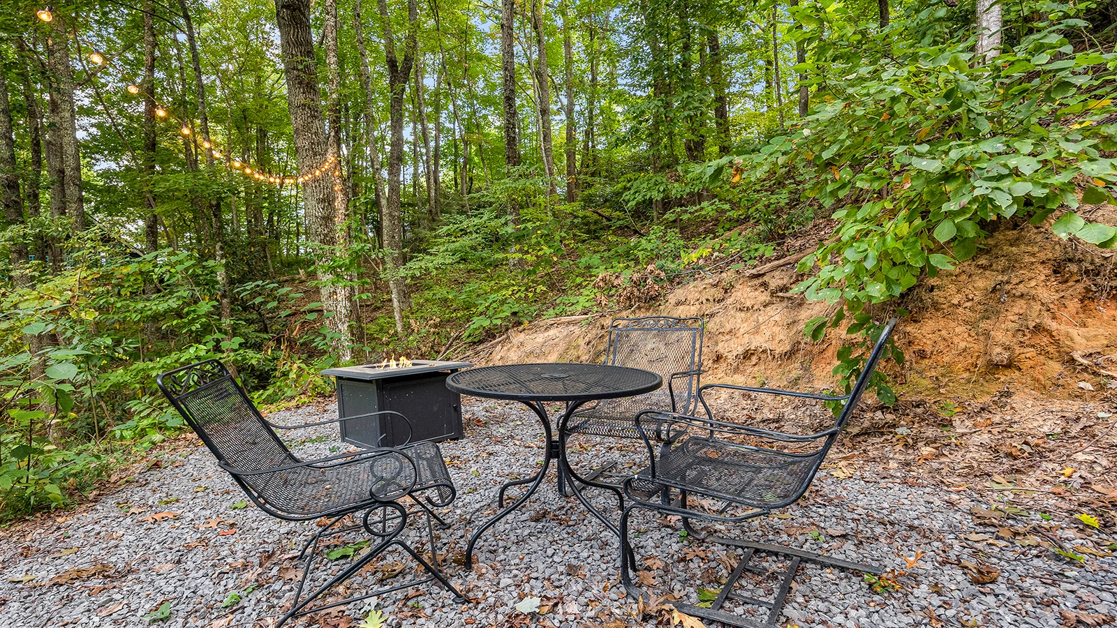 Sit around the glow of your chalet's fire pit.