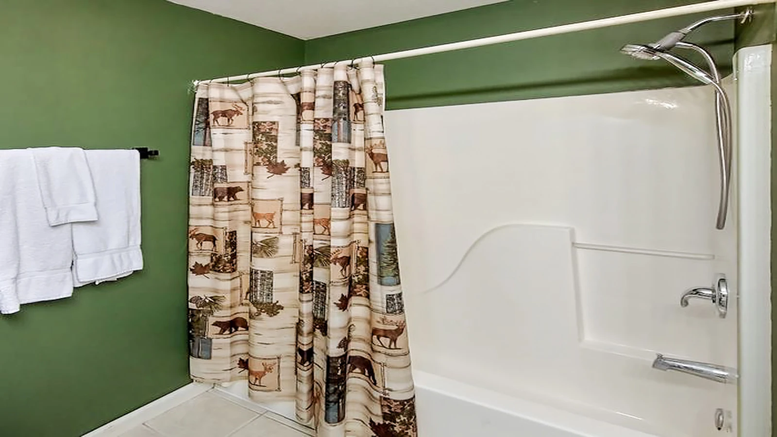 Tub and shower in bathroom one.