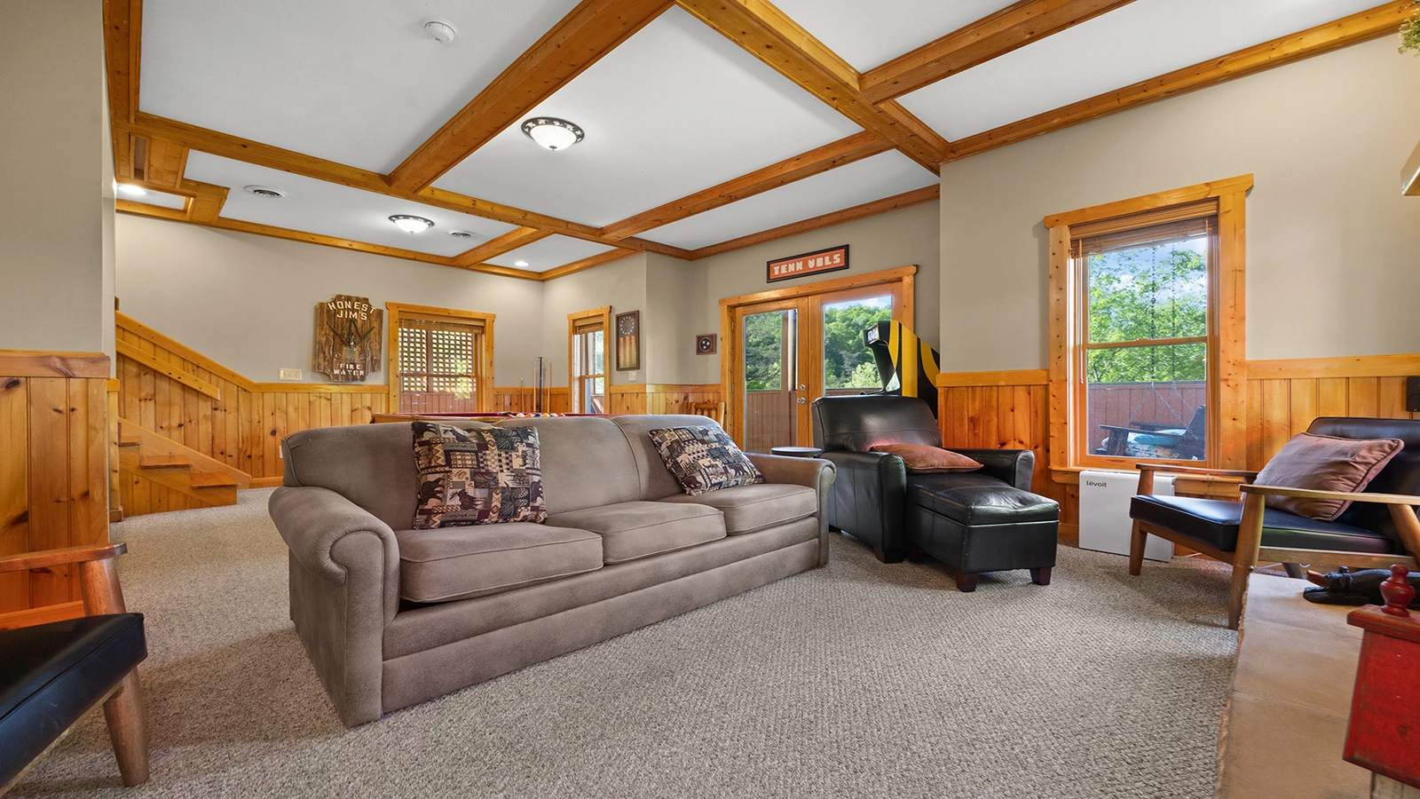 Plenty of seating for the family while enjoying your cabin's game room.