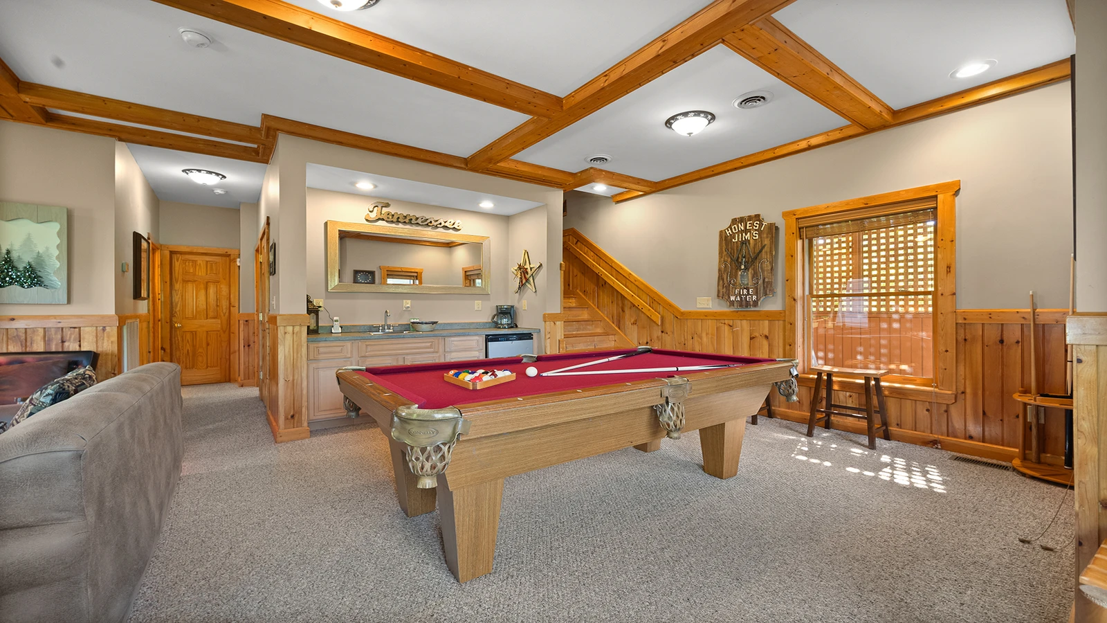 Full size pool table in your cabin's game room.
