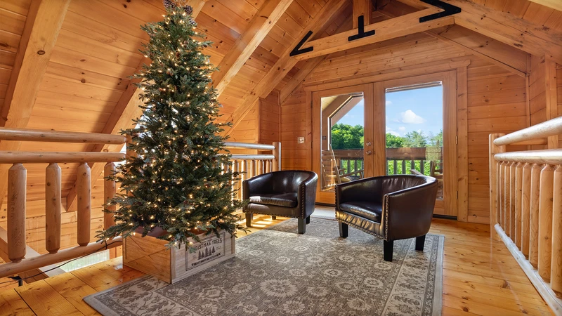 Loft seating along with walkway out onto the loft porch.
