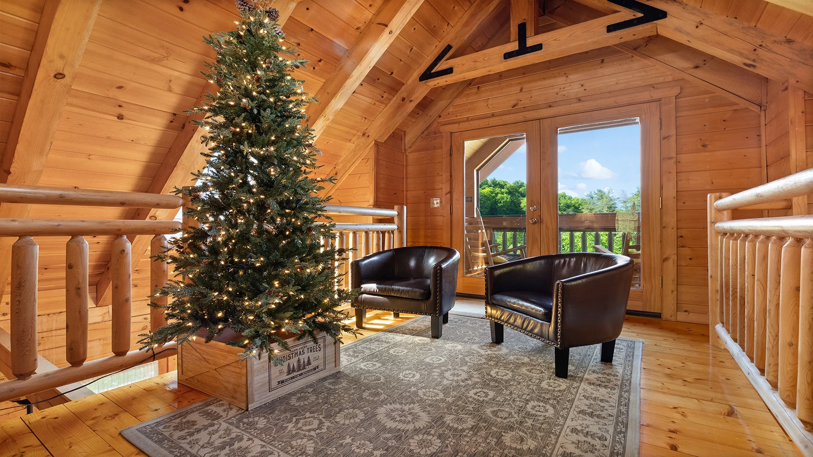 Loft seating along with walkway out onto the loft porch.