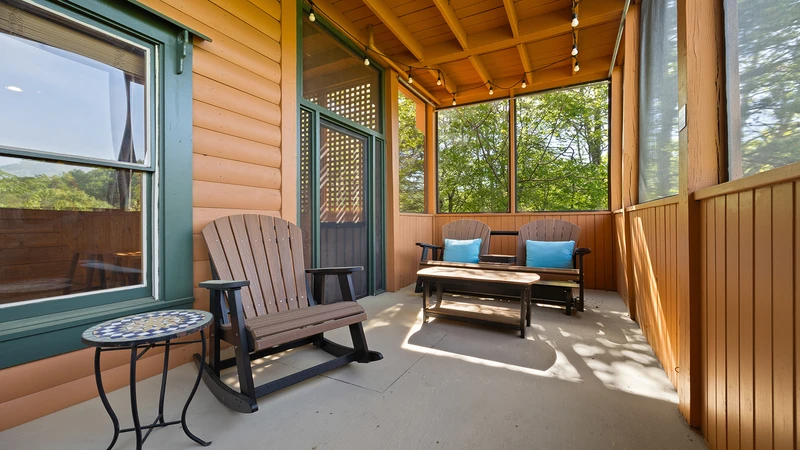 Plenty of seating in the screened in porch for taking in natures sounds.