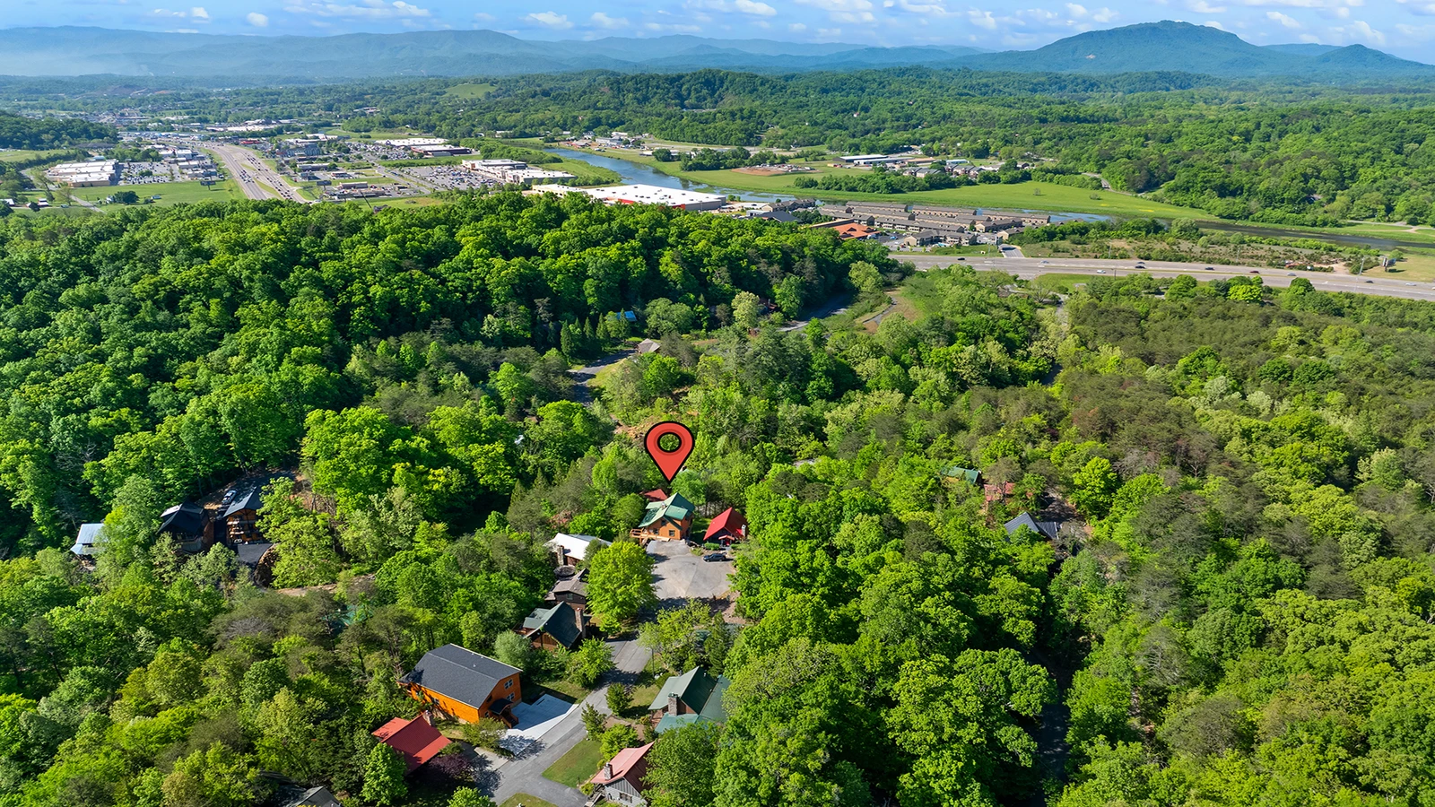 Moonlight Pines Lodge nestled in a wooded Smoky Mountains setting. 