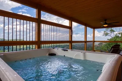 Family sized cabin hot tub with views of the Smoky Mountains.