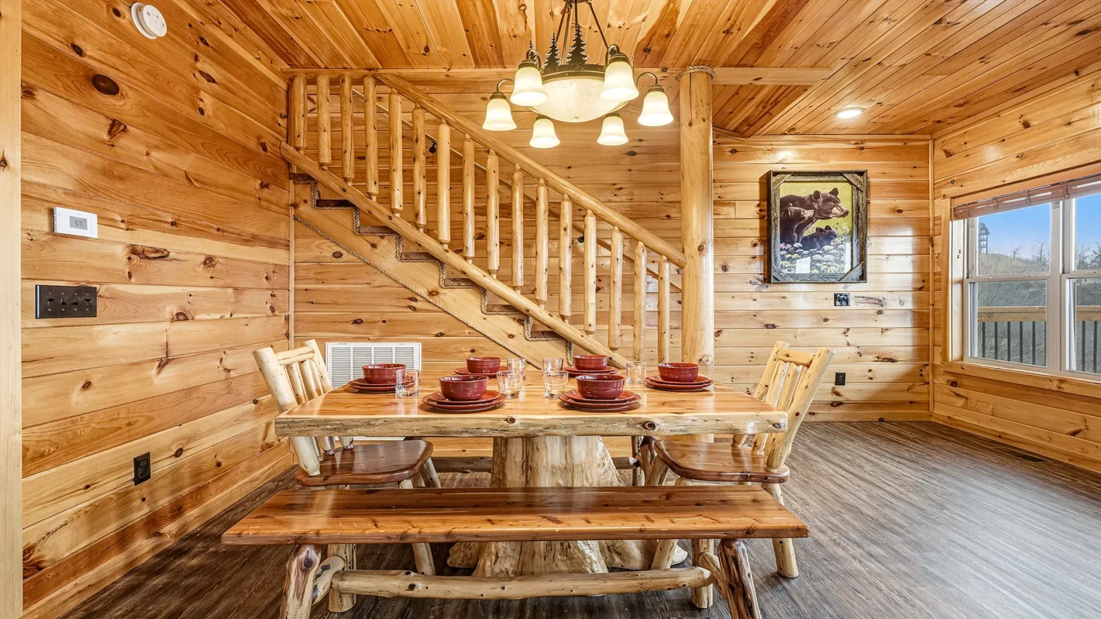 Large rustic log dining table for family meals and games.