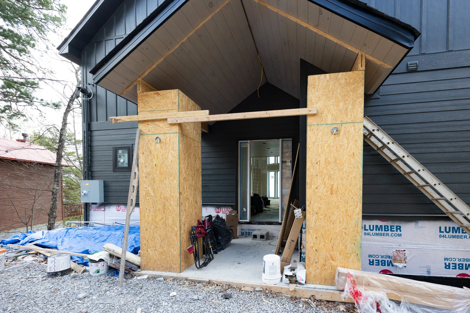 Workers hard at building the entry to a beautiful 3 bedroom cabin for your enjoyment.