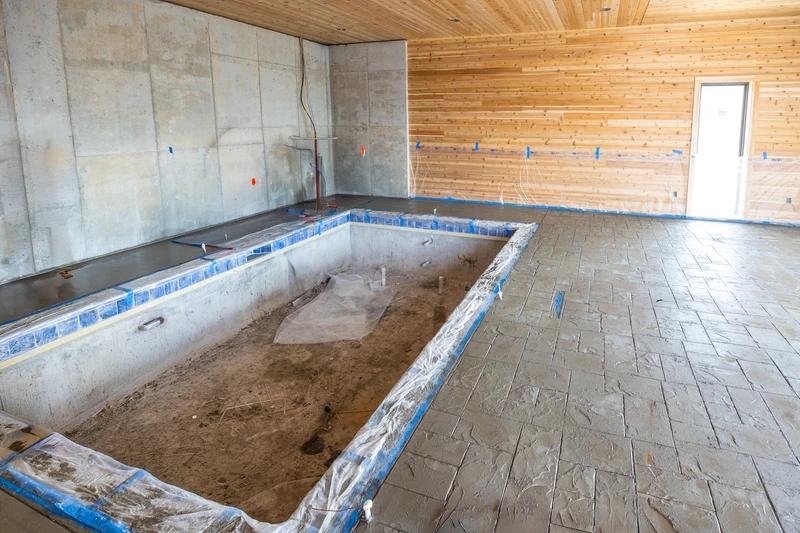 The start to a beautiful inground cabin swimming pool.