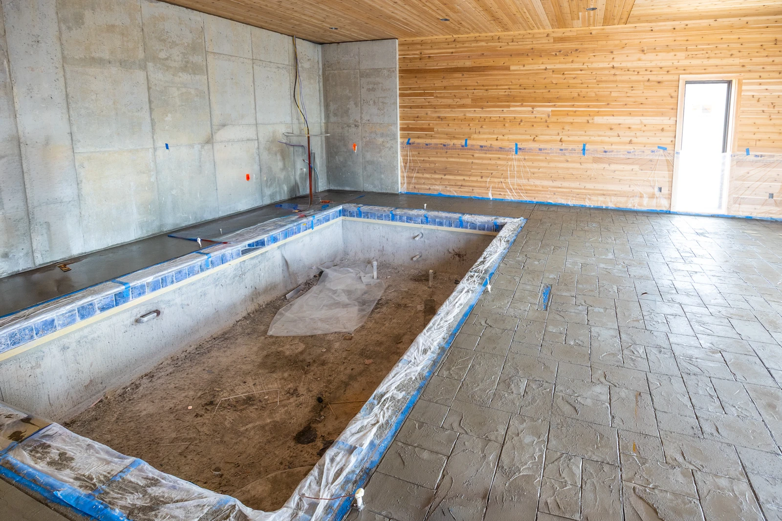 The start to a beautiful inground cabin swimming pool.