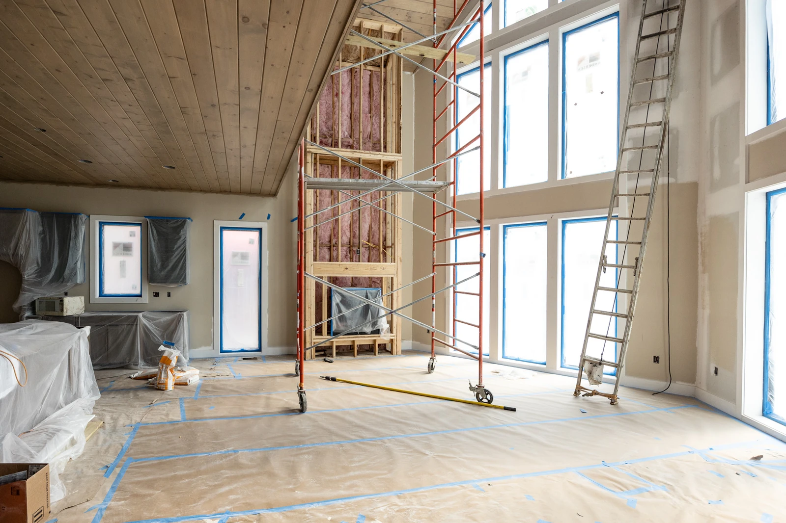 Start in building the floor-to-ceiling cabin fireplace.