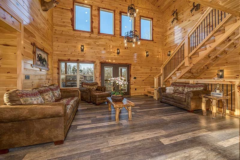 Living room with walk-out doors to the porch.