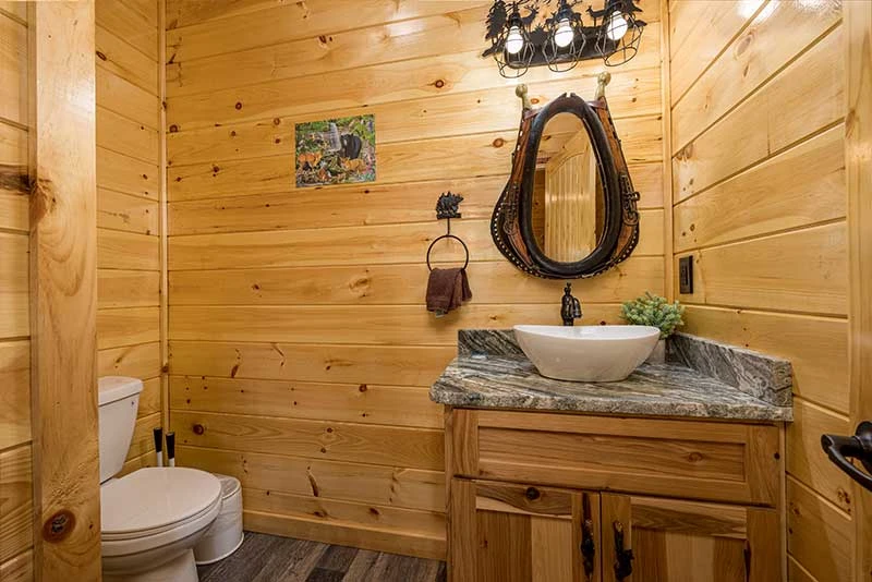 Find convenience with your cabin's main floor half-bath. 